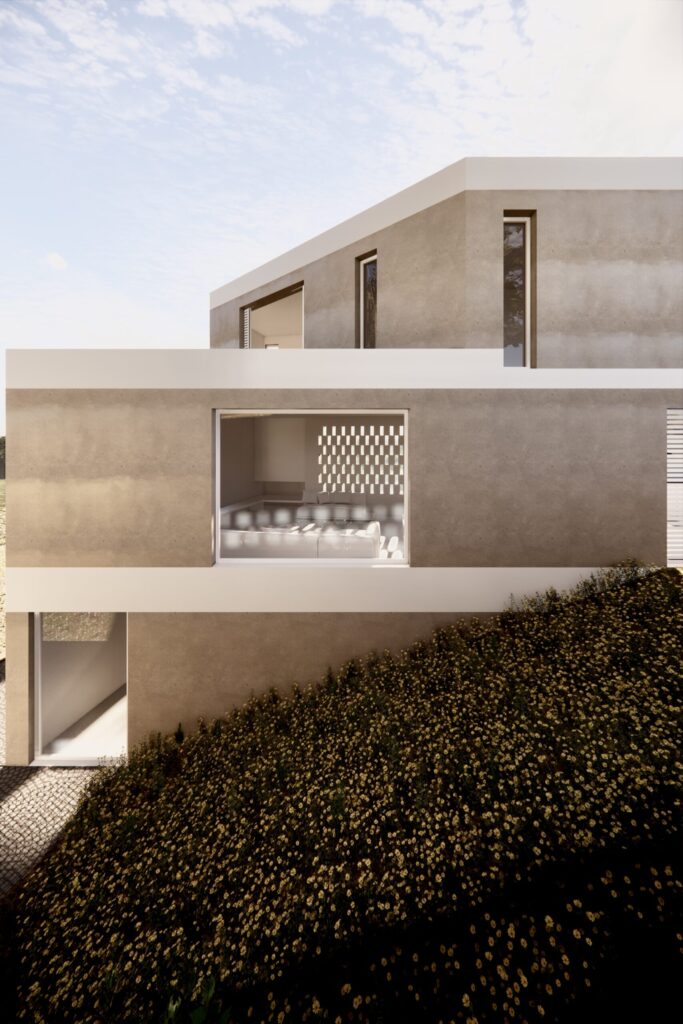 Façana de la casa Escaletes, a Sant Pol de Mar. Una casa ubicada en un terreny en pendent.