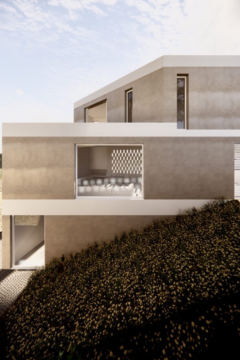 Façana de la casa Escaletes, a Sant Pol de Mar. Una casa ubicada en un terreny en pendent.